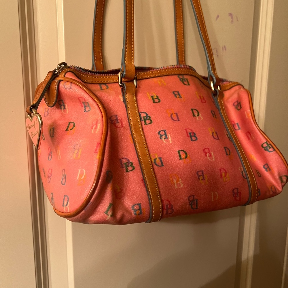 Multi color Dooney & Bourke rainbow monogram barrel handbag